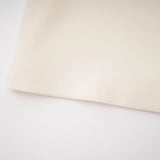 Ismérie Neutrals OffShoulder Twisted Mini Dress