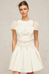 Maelle white flowerembroidered mini dress