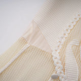 Maelle white flowerembroidered mini dress