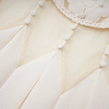 Maelle white flowerembroidered mini dress