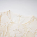 Maelle white flowerembroidered mini dress