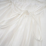 Quincie white shirred flounced mini dress